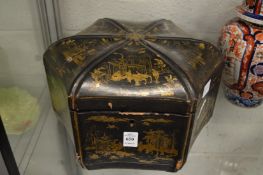 A Chinese export chinoiserie and gilt decorated lacquer moulded hexagonal shaped work box.