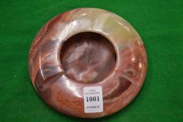 A carved onyx ashtray.