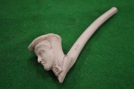 A decorative clay pipe.