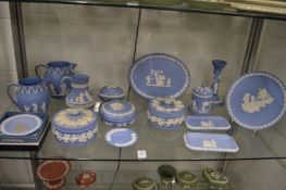 A good collection of Wedgwood pale blue jasperware to include boxes and covers.