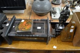 A wall clock, a figure, a metronome and a icon.