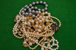 Various pearl necklaces.