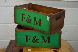 A pair of novelty pine storage boxes.
