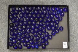 A quantity of blue glass beads.