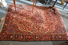 A Persian carpet, cream ground with all over floral decoration, ends worn 6'10