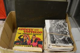Old Cine films, postcards and an album containing cigarette cards.