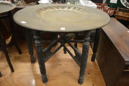An Eastern brass tray table.