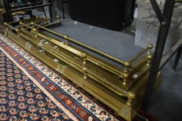 Three adjustable brass fenders.