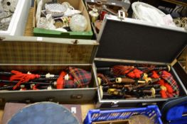 Two cased sets of bagpipes and an earlier part set.