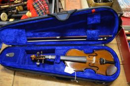 A cased military violin and bow.