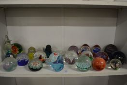 A collection of colourful paperweights.