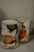 A pair of Japanese erotic brush pots.