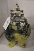 A Chinese marbled green soapstone tripod lidded sensor.