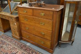 A mahogany chest of drawers.