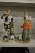 A pair of porcelain figures.