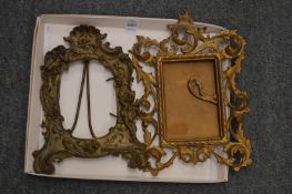 Two decorative photograph frames.