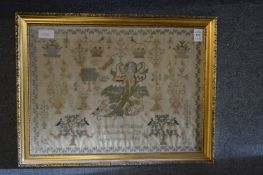 A 19th century sampler by Ann Minter aged 8 years, dated December 28th 1842.