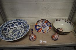 A Chinese blue and white bowl, imari china, another bowl (af).