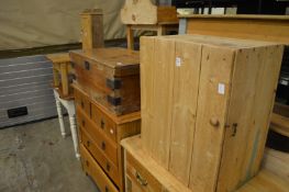 Two pine cupboards, a trunk and a coffee table.
