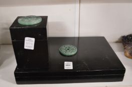 Two ebony boxes decorated with Chinese style hardstone roundels.