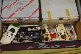 Various die cast Porsche and other cars.