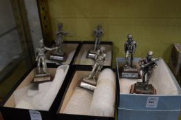 Six die cast metal figures of military personnel.