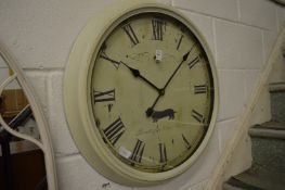 A large modern circular wall clock.