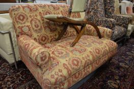 A Victorian style 'Cuddler' settee.