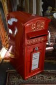 A reproduction cast iron post box.