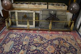 An unusual brass and onyx fender.