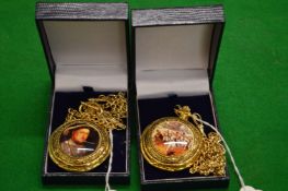 Two decorative pocket watches.