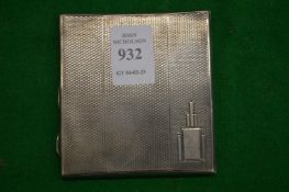 A silver cigarette case.