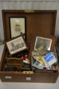 A box of miscellaneous collectables.