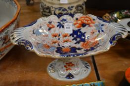 An ironstone pedestal dish.