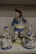 A group of porcelain figures.
