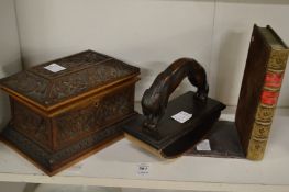 A good carved wood casket, a desk blotter and a book end.