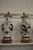 A large pair of Chinese crackle glaze porcelain lamp vases (faults).