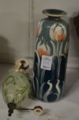 A Moorcroft Florian ware rise and fall ceiling light weight together with a Moorcroft style vase.