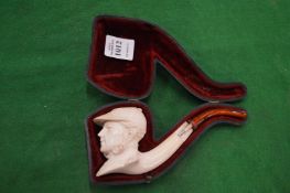 A carved meerschaum pipe of a gentleman, cased.