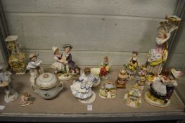 A quantity of decorative figurines and other china.