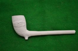 A decorative clay pipe.