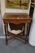 A Victorian rosewood work table.