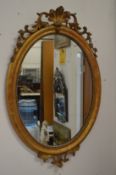 A good 19th century gilt framed oval wall mirror.