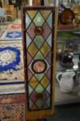 A stained glass window panel.