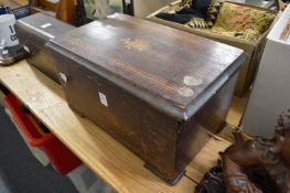 A Victorian cylinder music box with three bells.