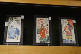 A set of three Chinese porcelain plaques.
