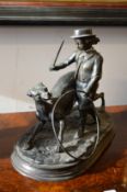 After Moigniez, cast bronze model of a child and dog.