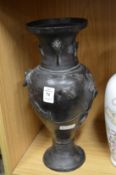 A Japanese cast metal vase.