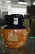 A Doulton salt glazed and blue glazed hunting jug.