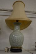 A Chinese vase lamp.